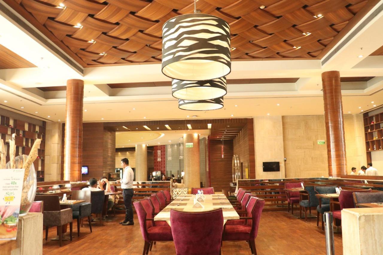昌迪加尔潘切库拉假日酒店 外观 照片 The interior of the restaurant