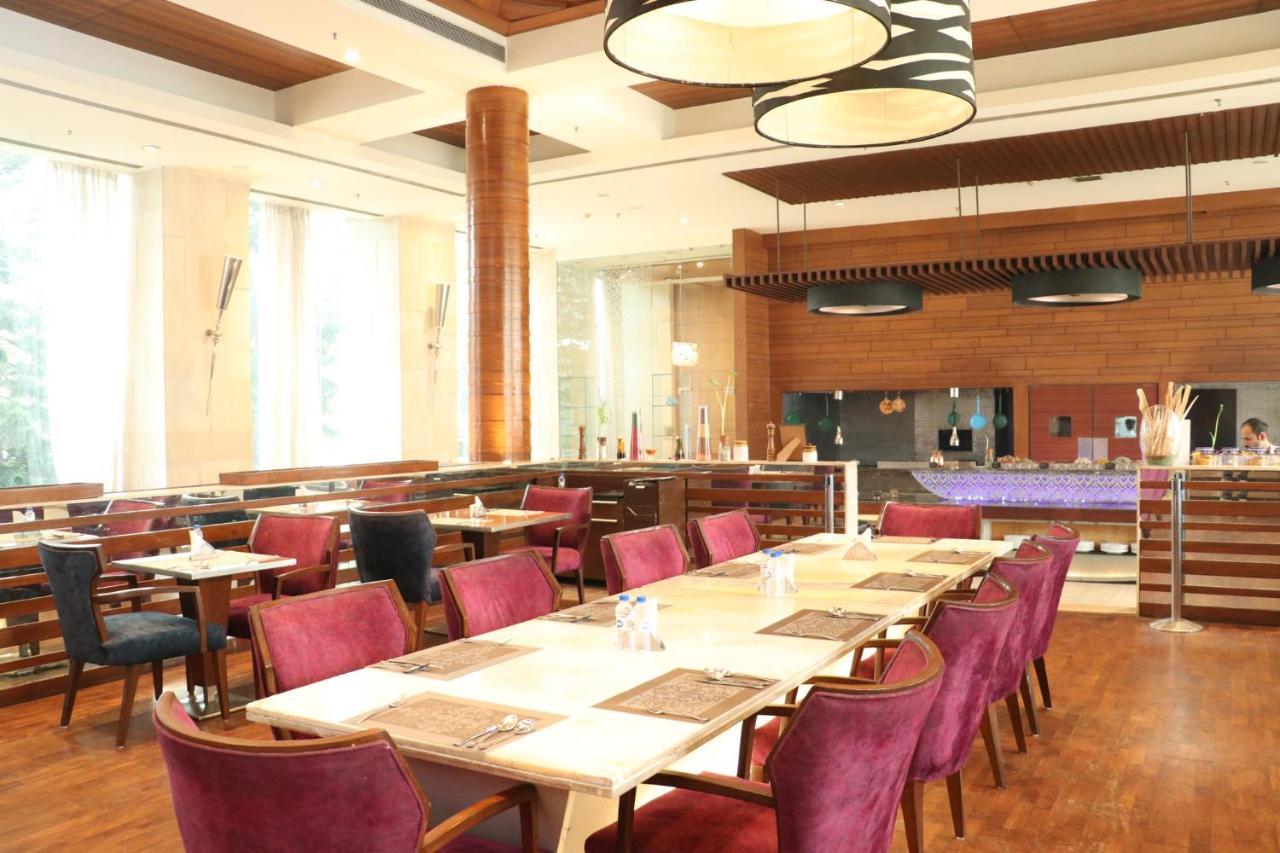 昌迪加尔潘切库拉假日酒店 外观 照片 The restaurant